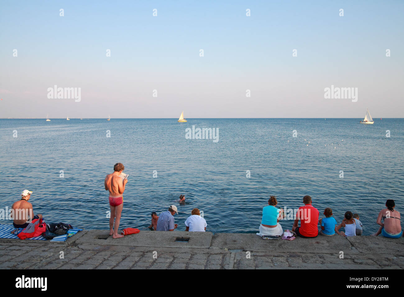 Crimea, Black Sea. Vacationers on the embankment Evpatoria Stock Photo