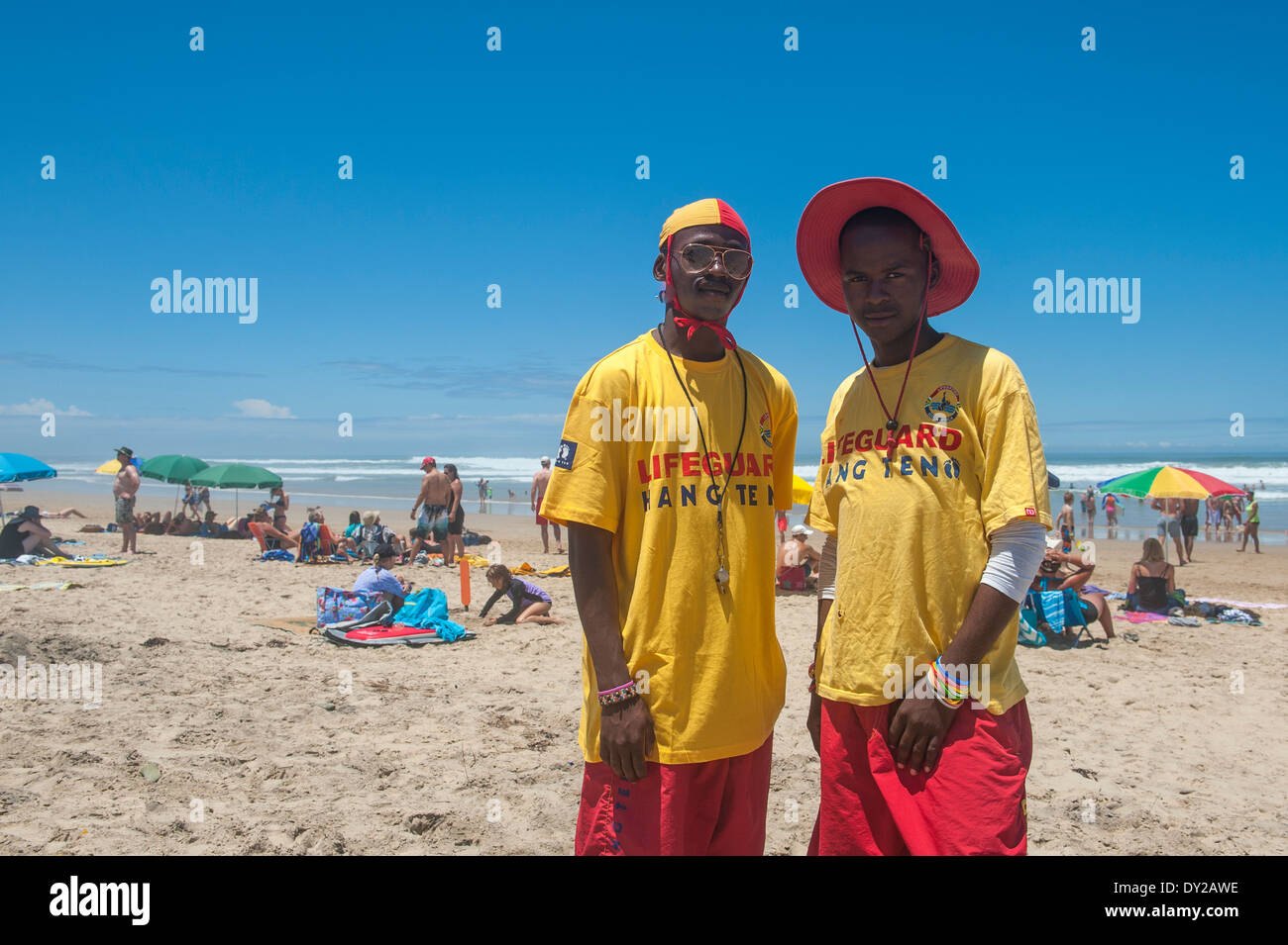 Lifeguards and holidaymakers on the beach of Morgan Bay, Eastern Cape, South Africa Stock Photo