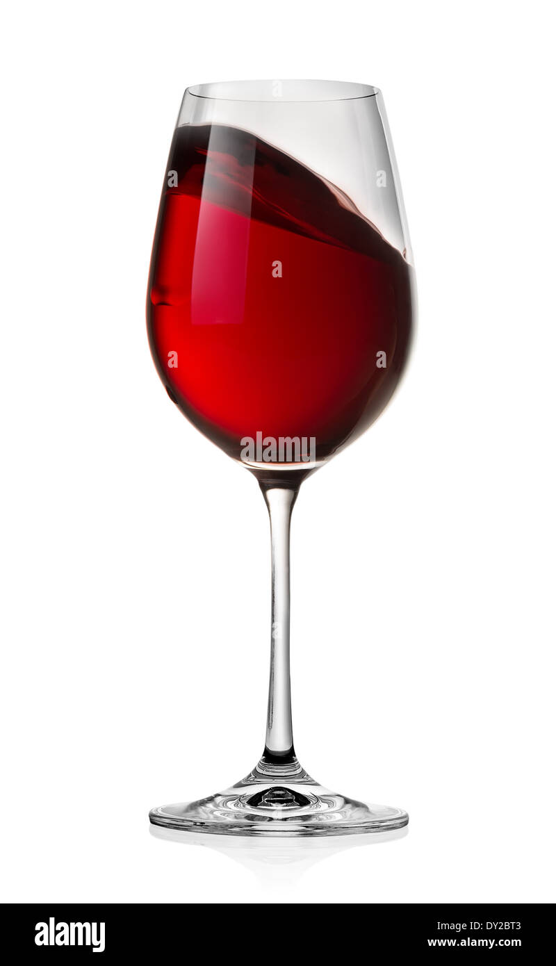 Waving red wine in a glass isolated on a white background Stock Photo