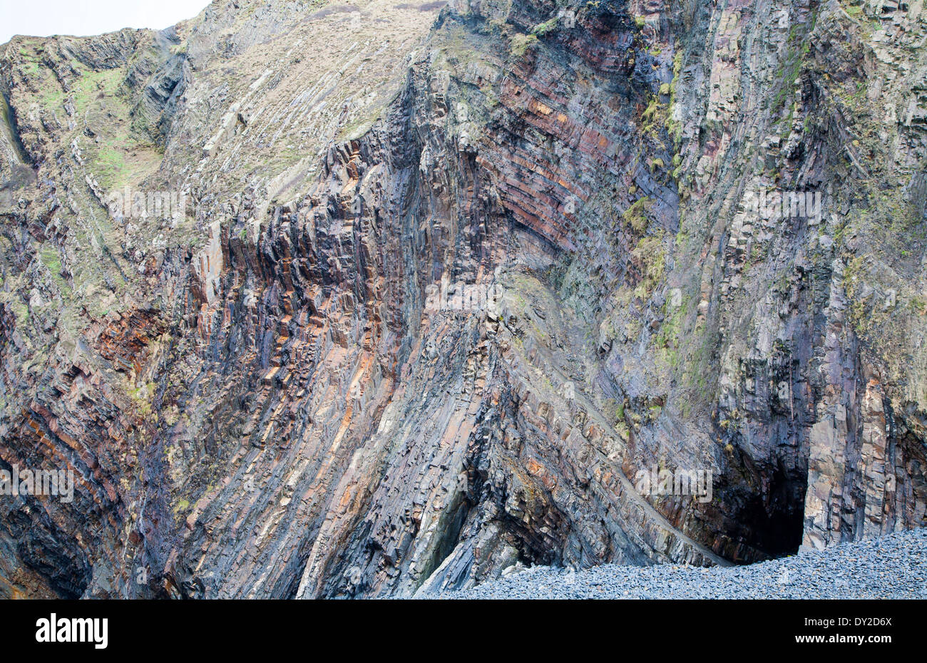 Complex folding of sedimentary rock strata in coastal cliffs at ...