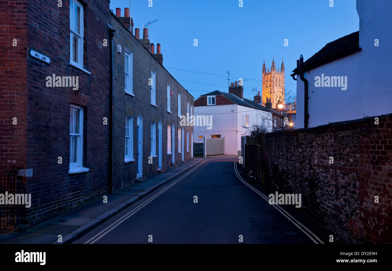 Mill Lane at dusk, a little quaint street in Canterbury, with the Cathedral illuminated in the distance. Stock Photo