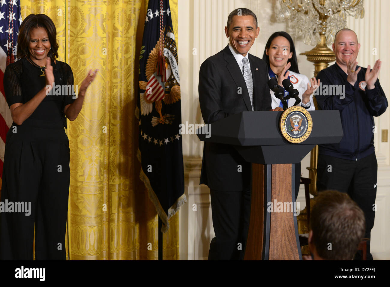 US President Barack Obama speaks during a ceremony to honor Paralympic and Olympic athletes in the East Room of the White House April 3, 2014 in Washington, D.C. Stock Photo