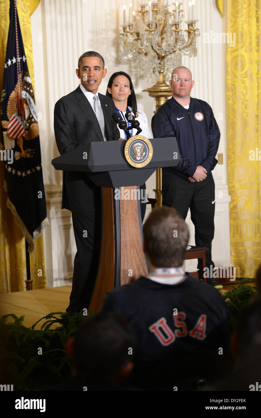 US President Barack Obama speaks during a ceremony to honor Paralympic and Olympic athletes in the East Room of the White House April 3, 2014 in Washington, D.C. Stock Photo