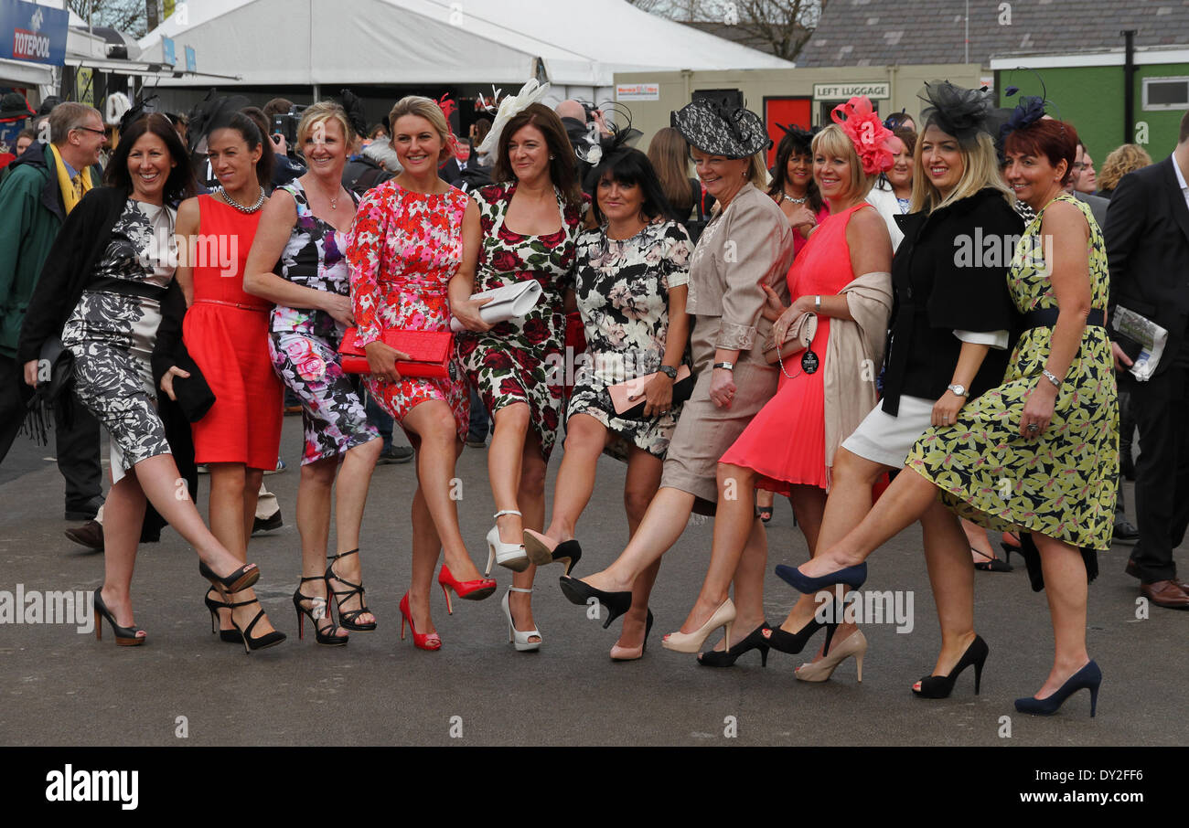 Liverpool, UK. 04th Apr, 2014. Group of female attendees show their finest at Ladies Day at Aintree on day two of The Three Day Grand National Meeting from Aintree Racecourse Credit:  Action Plus Sports/Alamy Live News Stock Photo