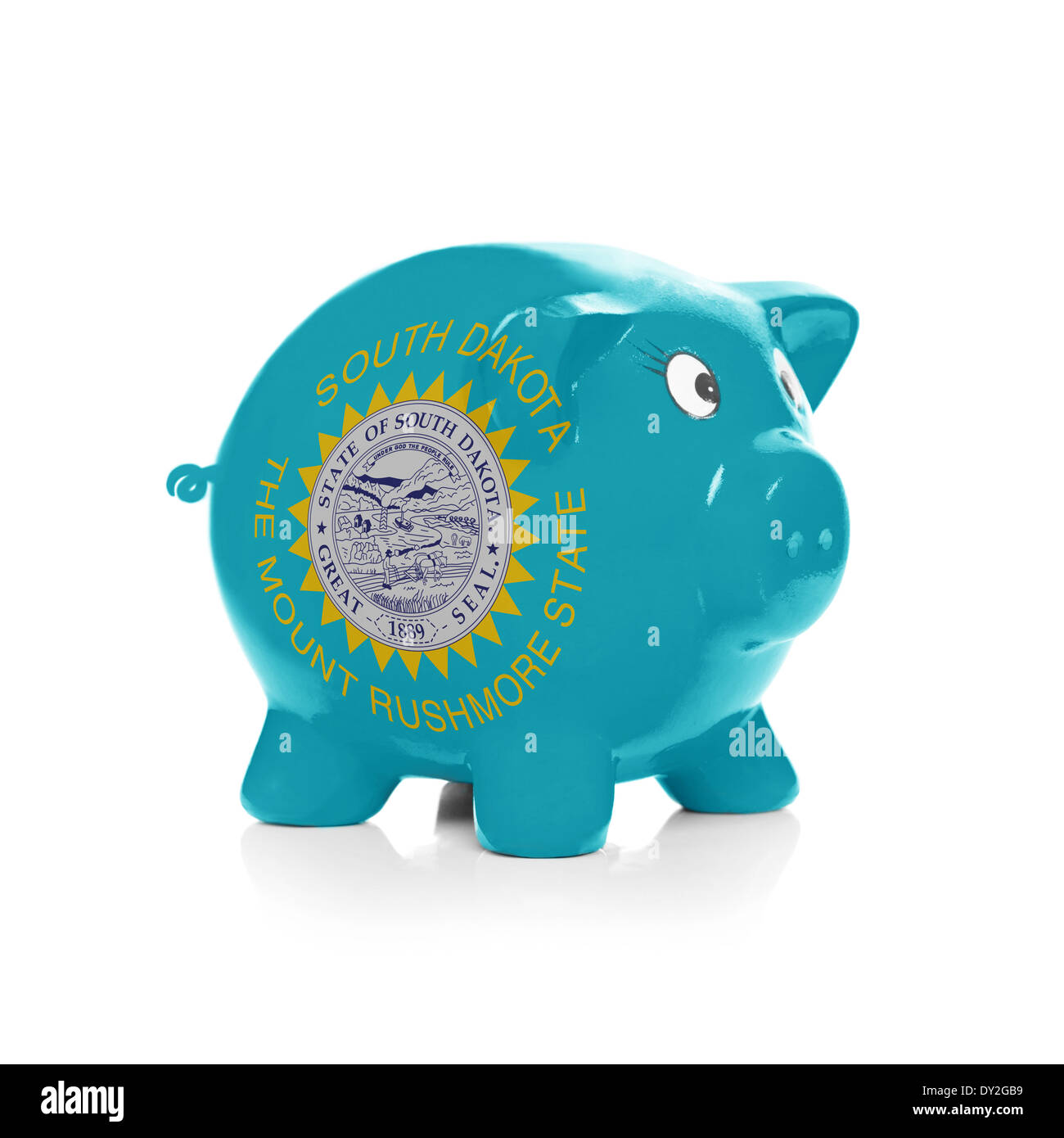 Green piggy bank with dollars sticking out isolated on white