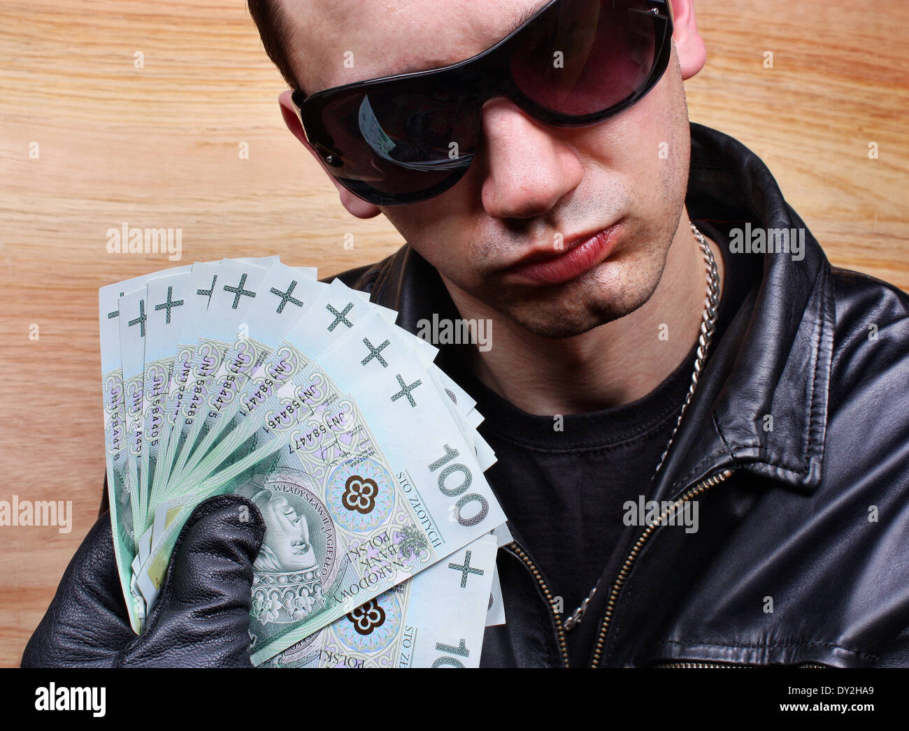 Chief boss mafia gangster thug with stolen money euro Stock Photo - Alamy