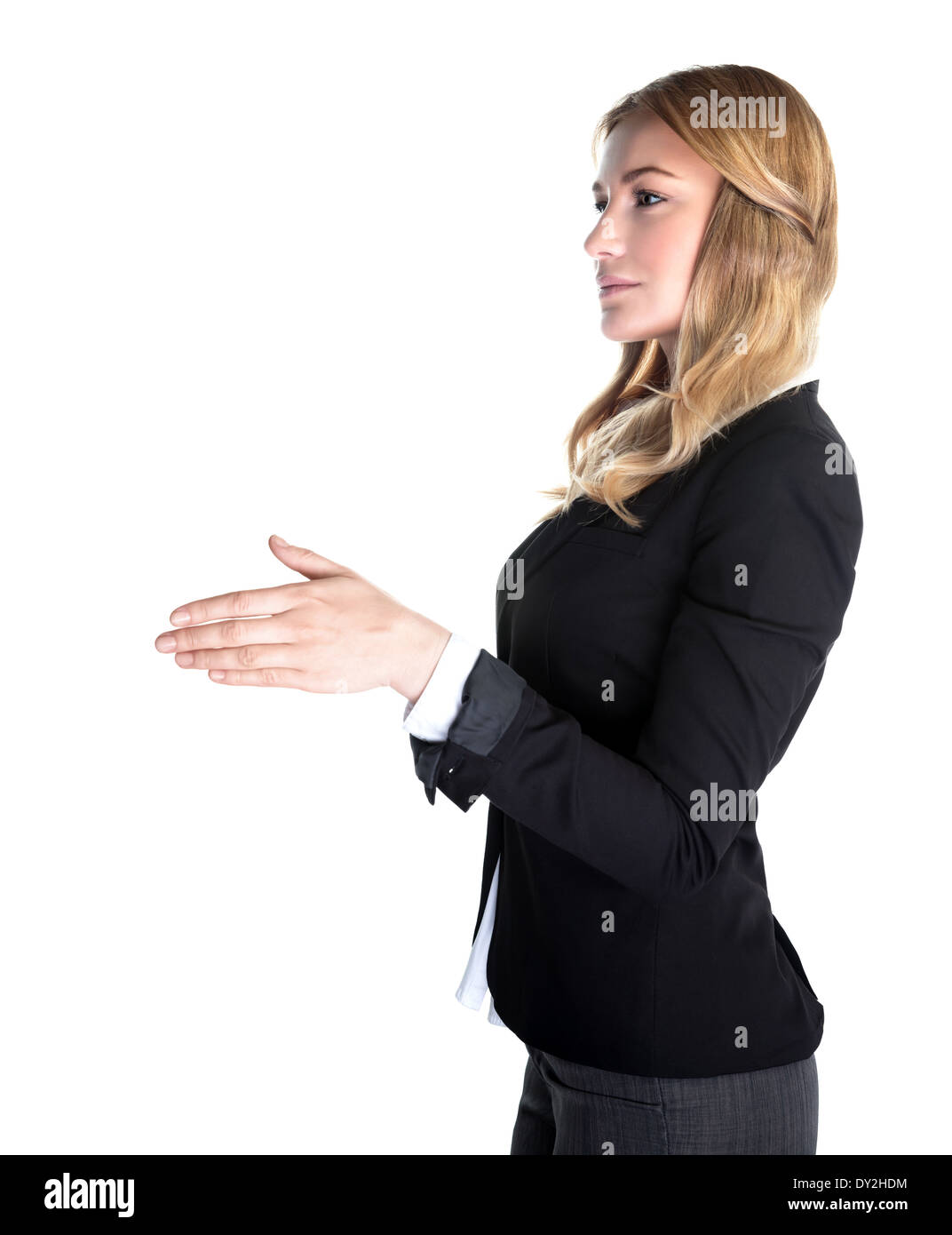 Portrait of attractive business lady stretches out her hand for a handshake, side view, isolated on white background Stock Photo