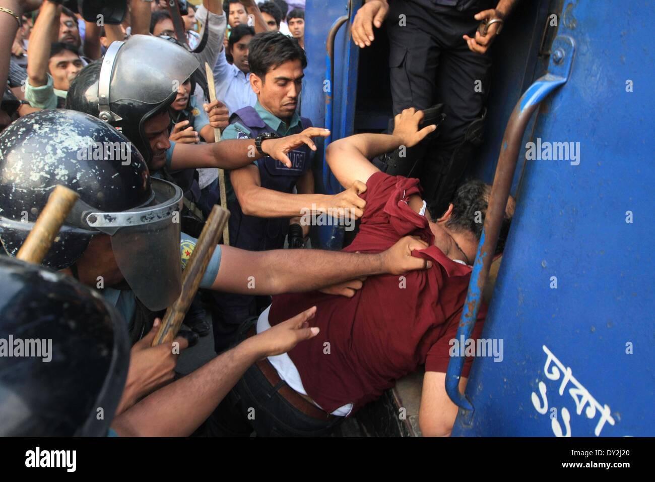Dhaka, Bangladesh. 4th April 2014. Ganajagaran activists have been baton charged by police on Friday at Shahbagh intersection in Dhaka,  as the organization tired to hold a rally at the place. Stock Photo