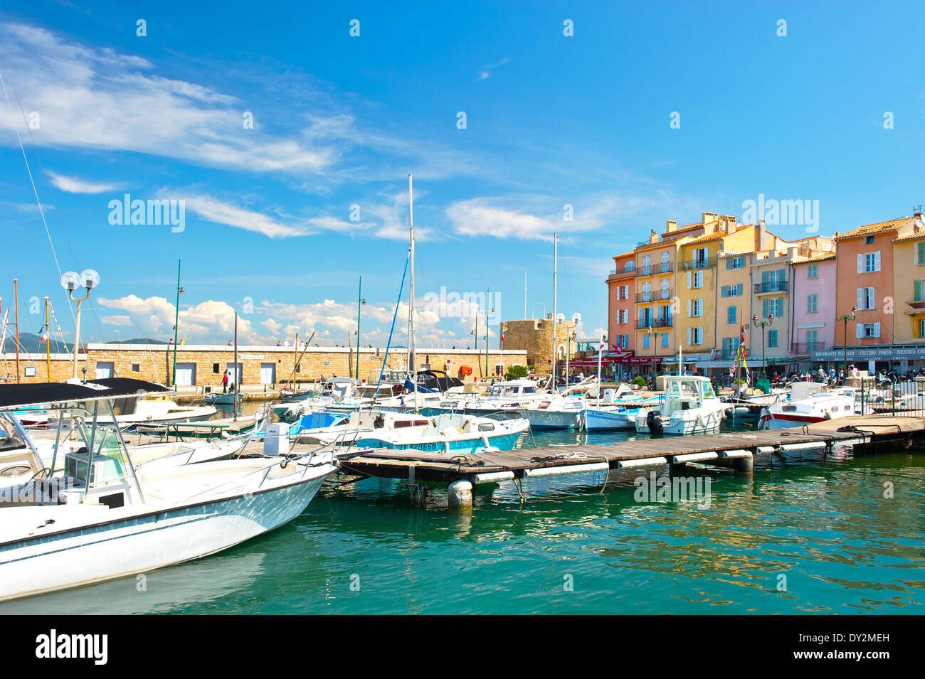 mediterranean landscape with boats and old buildings in harbor of Saint Tropez Stock Photo