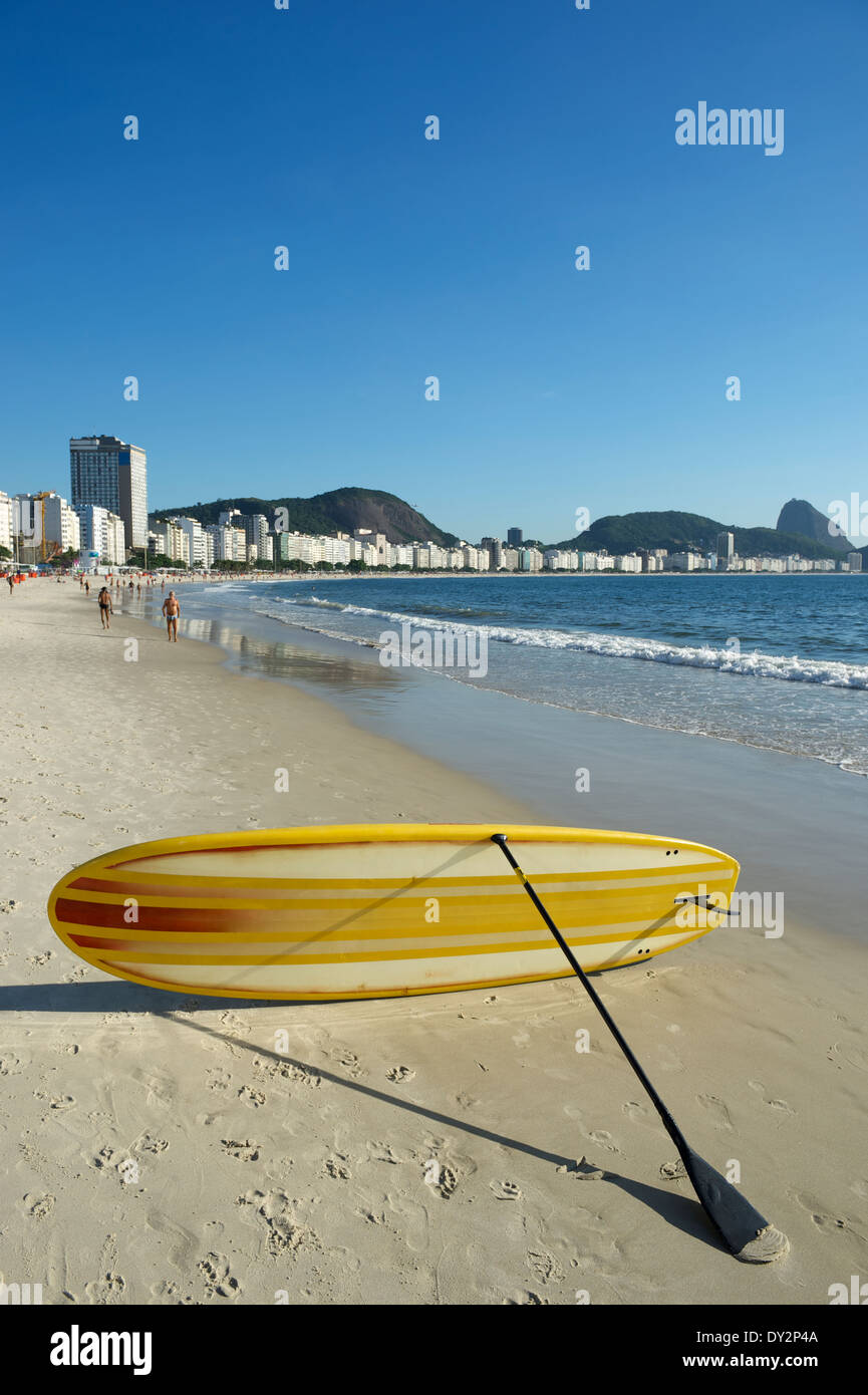 Stand up paddle long board surfboard on Copacabana Beach Rio de Janeiro Brazil Stock Photo