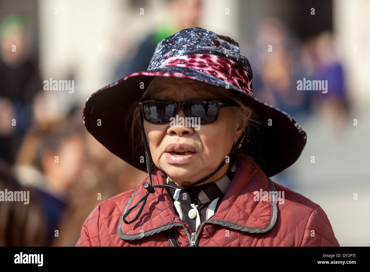 Old Asian elderly woman in hat sunglasses, tourist Prague Czech Republic old woman aging Stock Photo