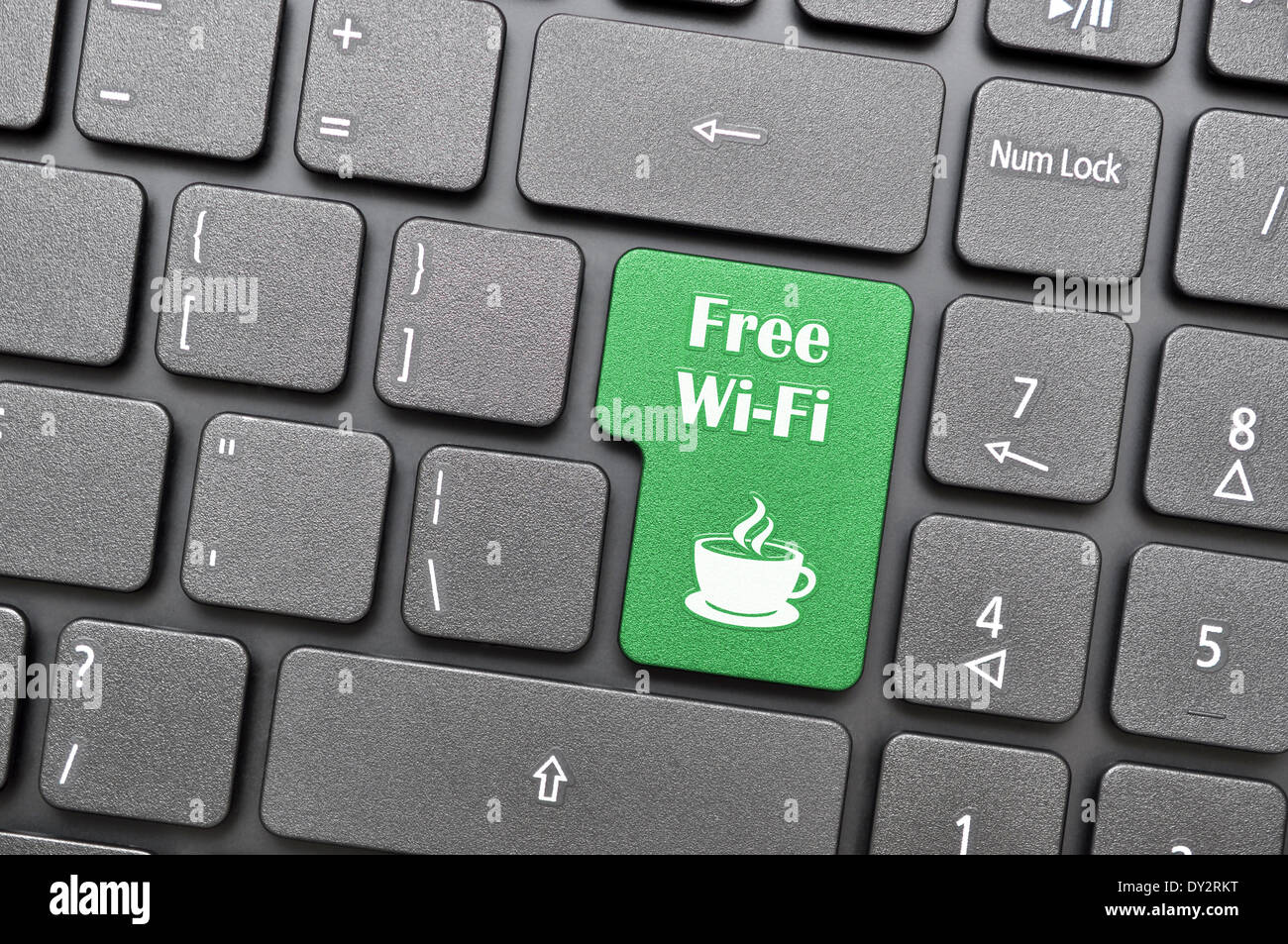 Free wifi in coffee shop on keyboard Stock Photo