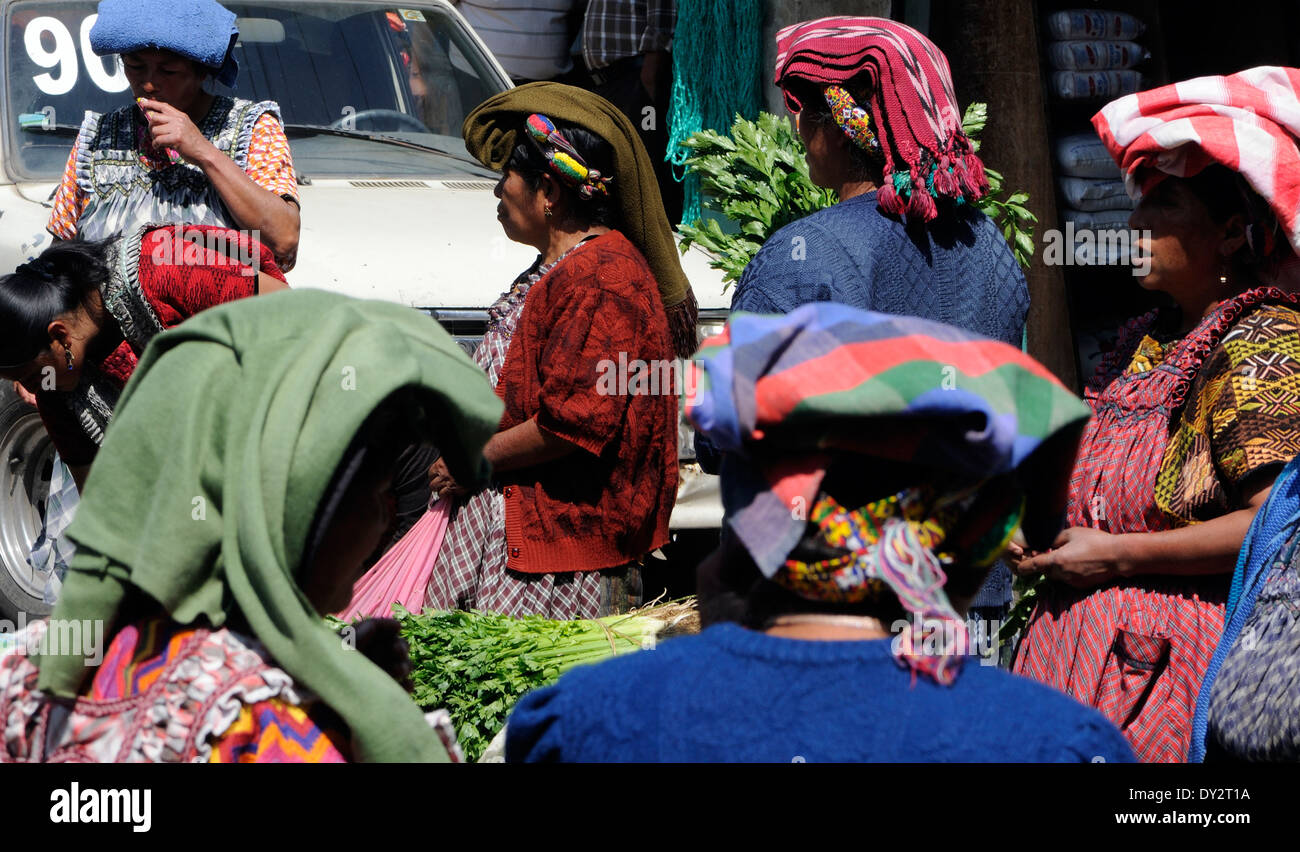 Women with traditional headgear at the  fruit and vegetable market at Almolonga. Stock Photo