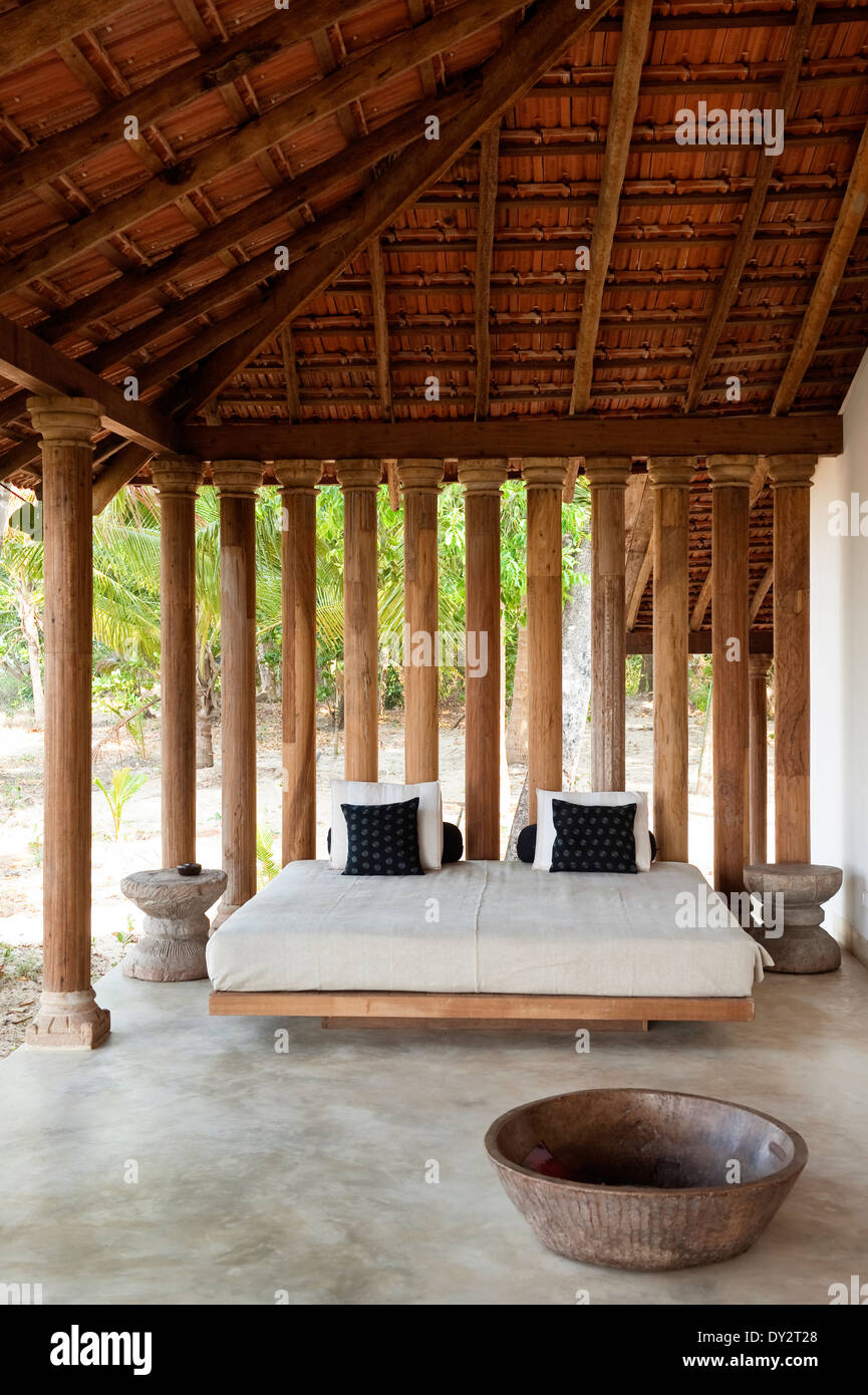 Mattress with cushions on veranda of Goan beach house retreat, India Stock Photo