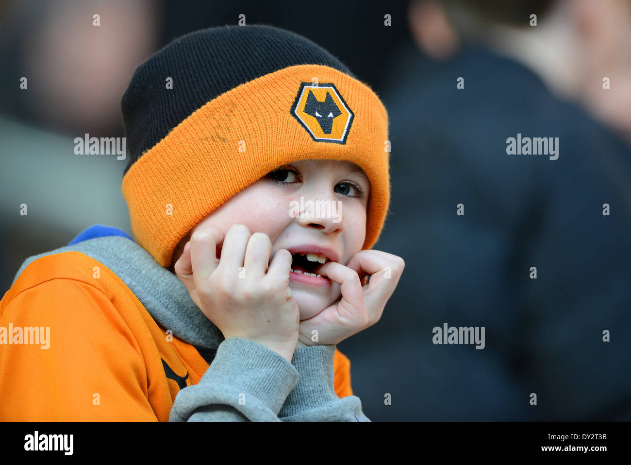 Young boy football supporter wearing woolen hat Uk Stock Photo