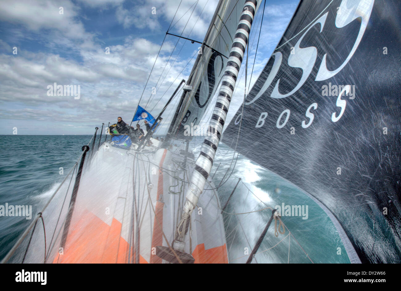 Onboard Hugo Boss  racing around the Isle of Wight in the Artemis Challenge. Skipper Alex Thomson & Crew along with celebrity Ew Stock Photo