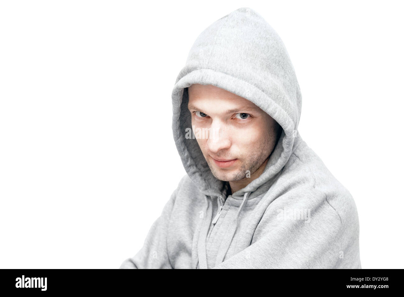 Young Caucasian man in gray jacket with hood. Studio portrait isolated on white Stock Photo