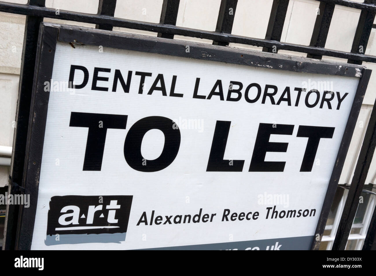 A sign advertising a Dental Laboratory To Let, in central London. Stock Photo