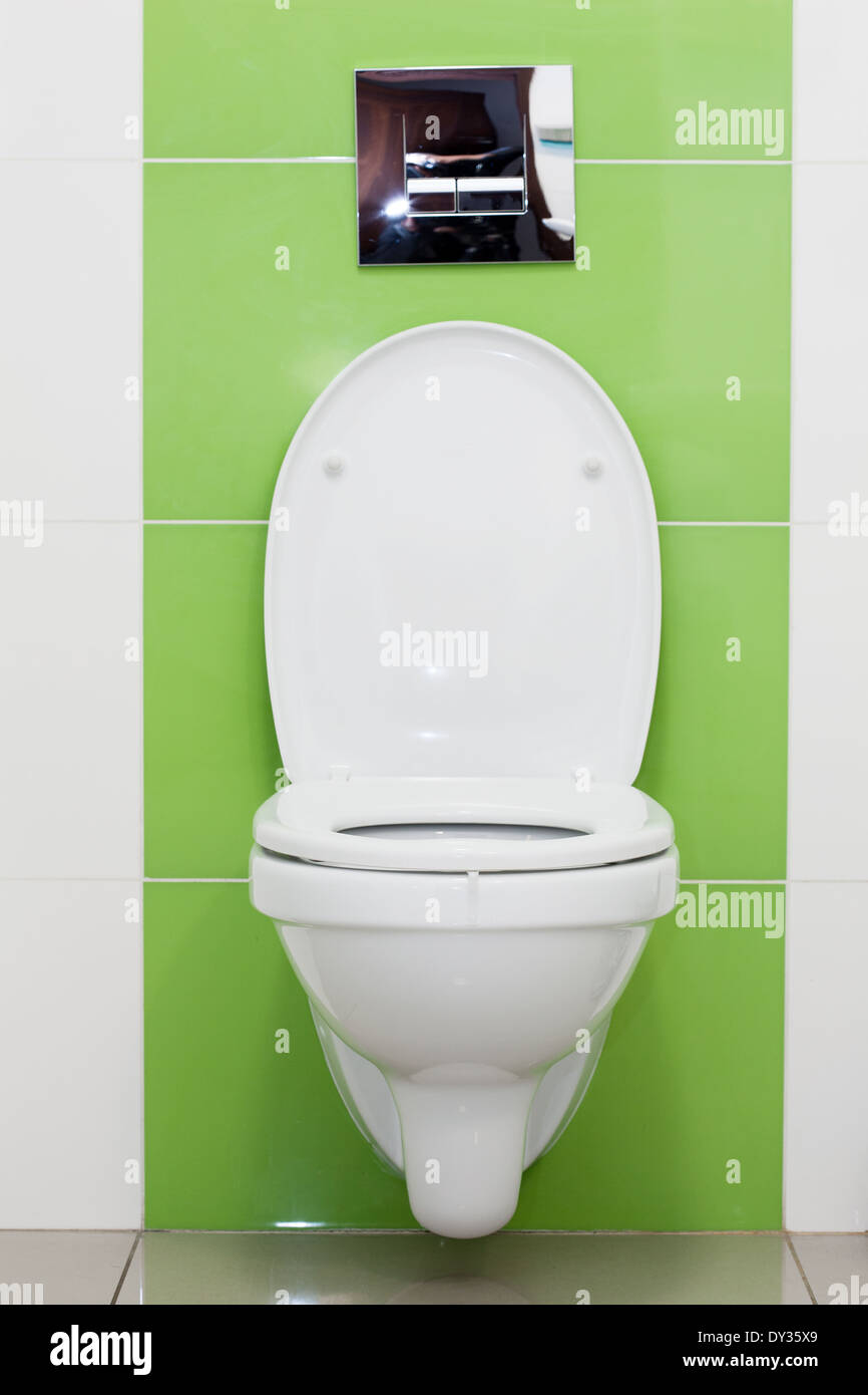 White toilet bowl in a bathroom Stock Photo - Alamy