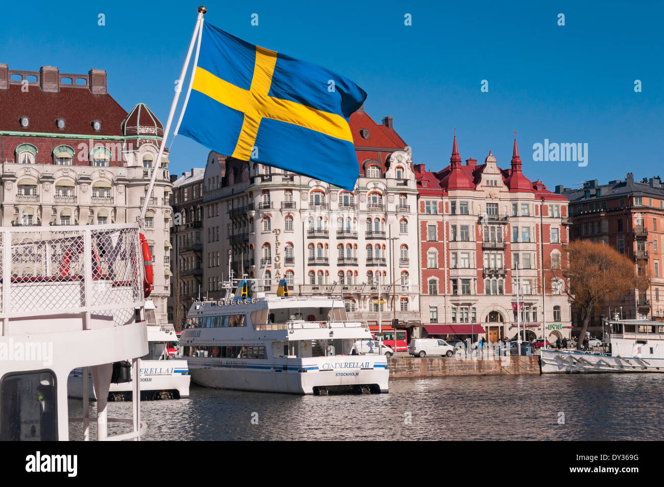 Harbour and Hotel Diplomat. Swedish flag. Ostermalm Stockholm Sweden Stock Photo