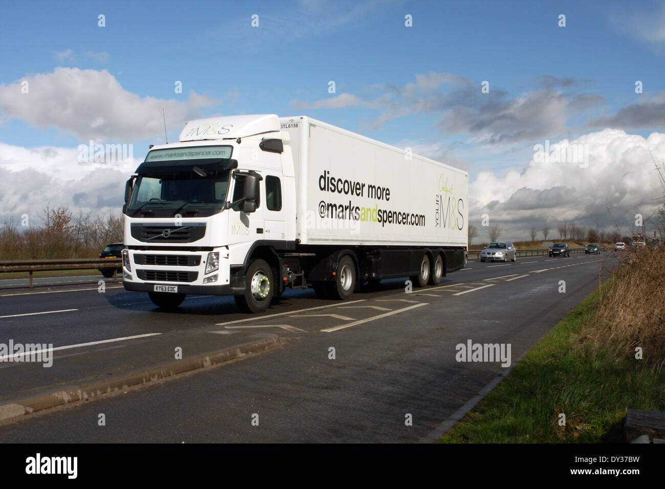 A Marks and Spencer truck traveling along the A46 dual carriageway in Leicestershire, England Stock Photo