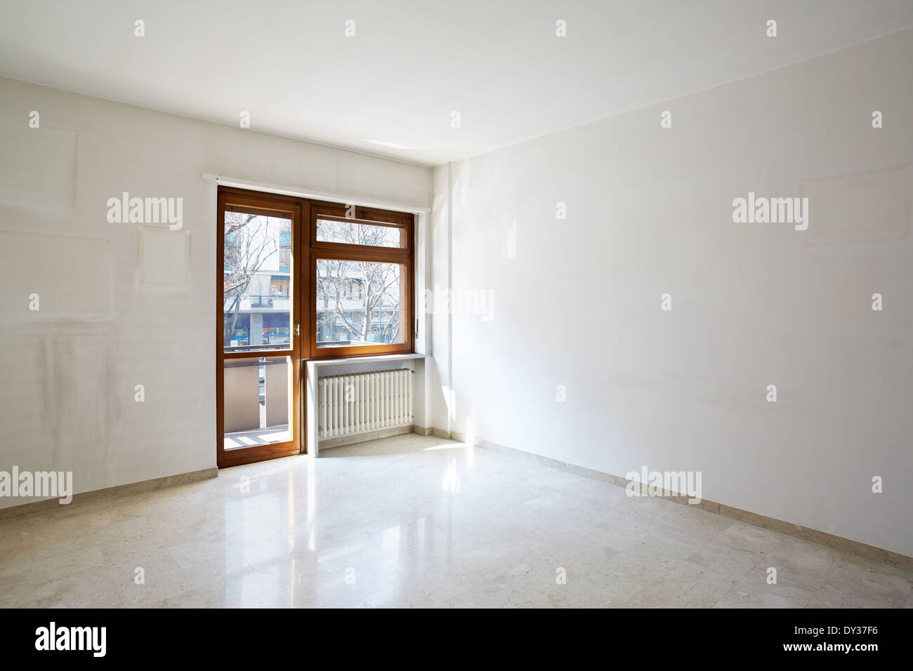Room with marble floor in empty apartment Stock Photo