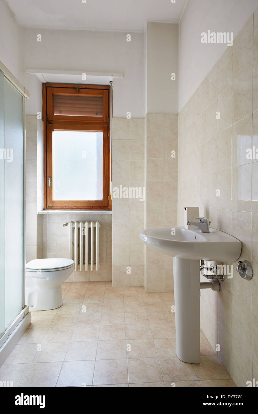 Simple bathroom in small, normal apartment Stock Photo