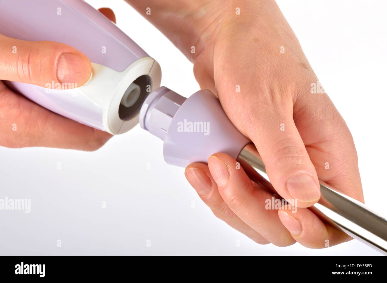 Isolated hand blender in woman hand Stock Photo