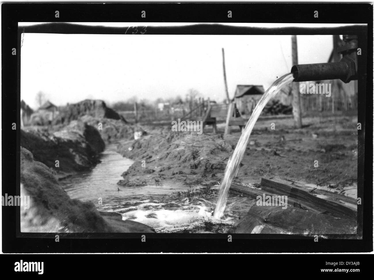 This photograph shows the side view of a newly constructed well, highlighting the development of infrastructure and water systems in rural areas. Stock Photo