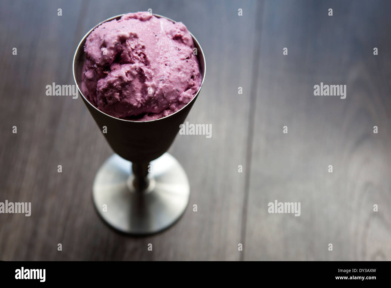blueberry ice cream presented in a spun aluminium goblet Stock Photo