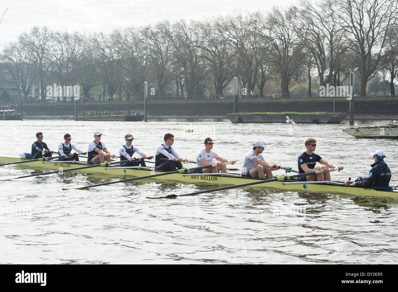 London, UK. 5th April 2014. Practice Outing by Oxford University Boat Club Blue boat in preparation for the Universities Boat Race on Sunday 6 April 2014.  Location:- River Thames, between Putney (start) and Mortlake.   OUBC Blue Boat crew (Dark Blue tops):- Bow: Storm UrU, 2: Tom Watson, 3 Karl Hudspith, 4 Thomas Swartz, 5 Malcolm Howard, 6 Michael Di Santo, 7, Sam O’Connor, Stroke: Constantine Louloudis, Cox: Laurence Harvey, Chief Coach: Sean Bowden. Credit:  Duncan Grove/Alamy Live News Stock Photo