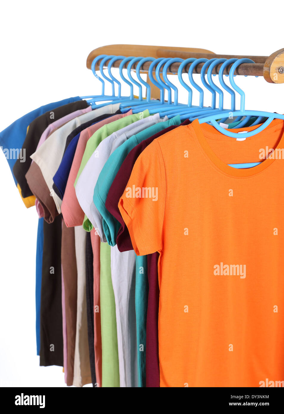 t-shirts hanging on hangers isolated on white background Stock Photo