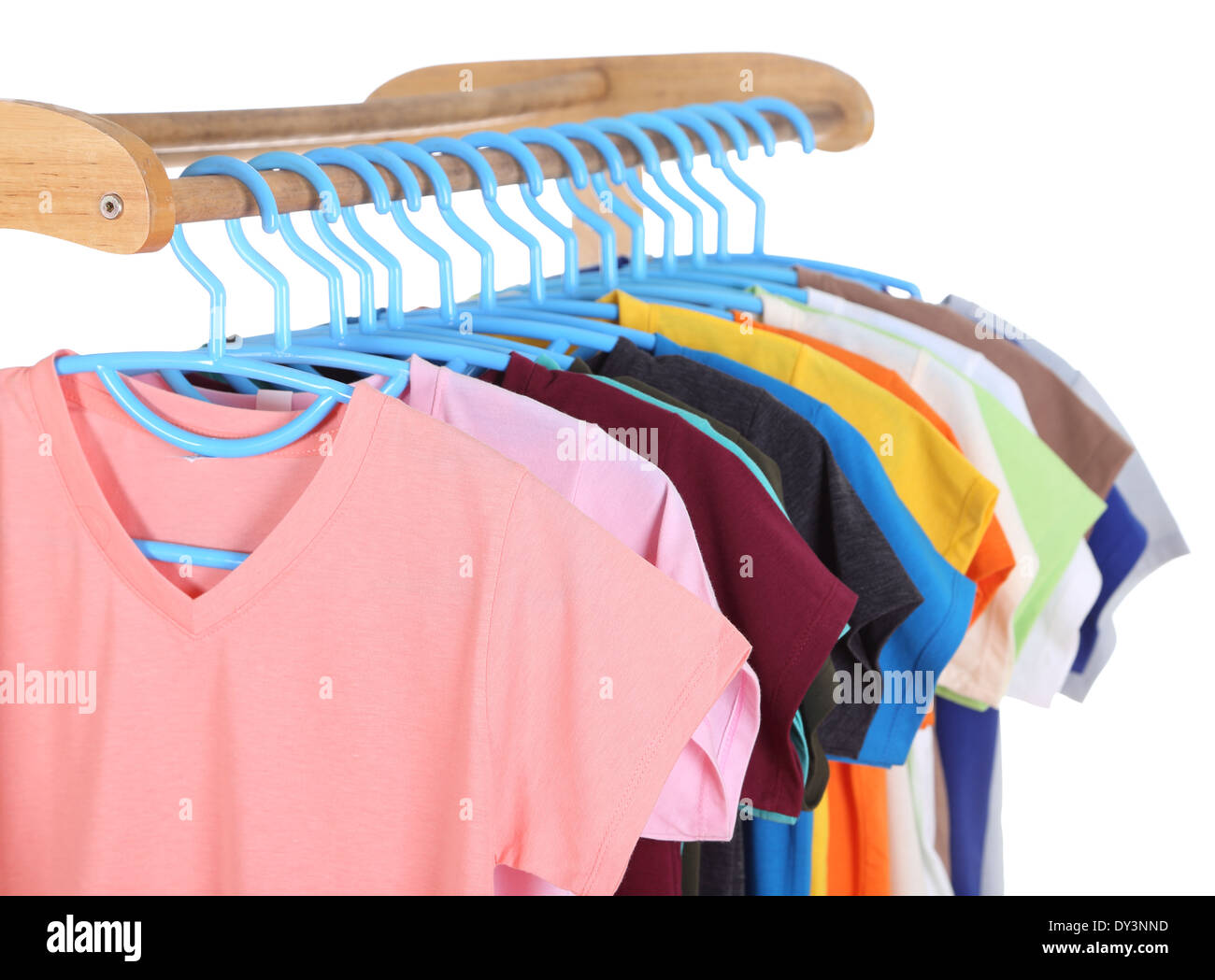 t-shirts hanging on hangers isolated on white background Stock Photo ...
