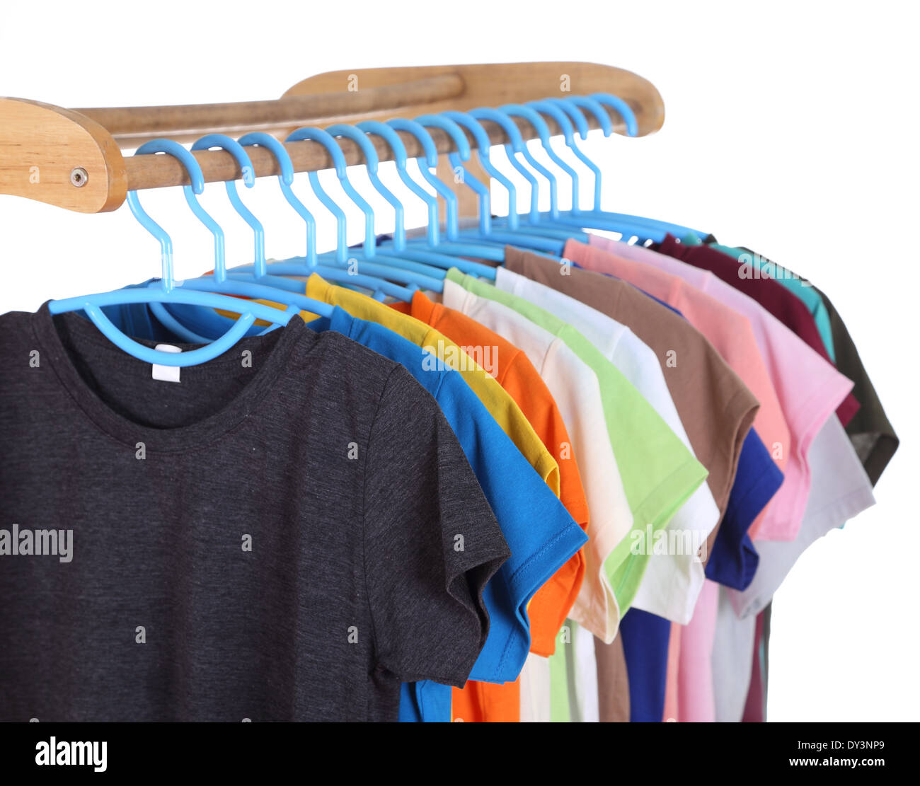 Row T Shirts Hanging On Hangers Stock Photos & Row T Shirts Hanging On ...