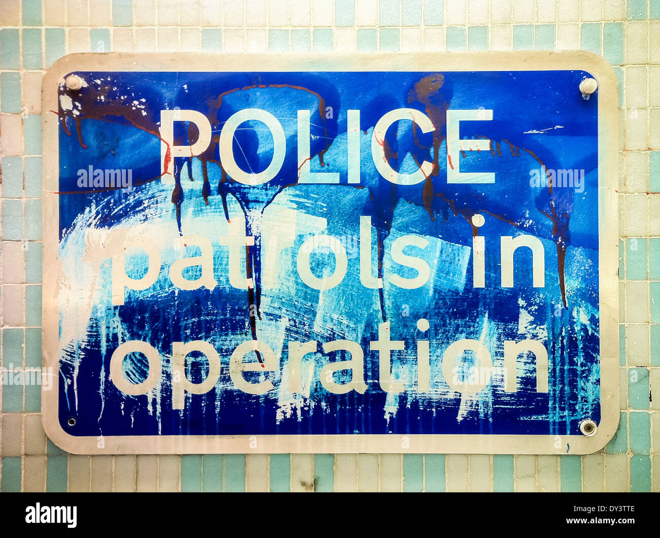 Police patrols in operation sign in london subway Stock Photo