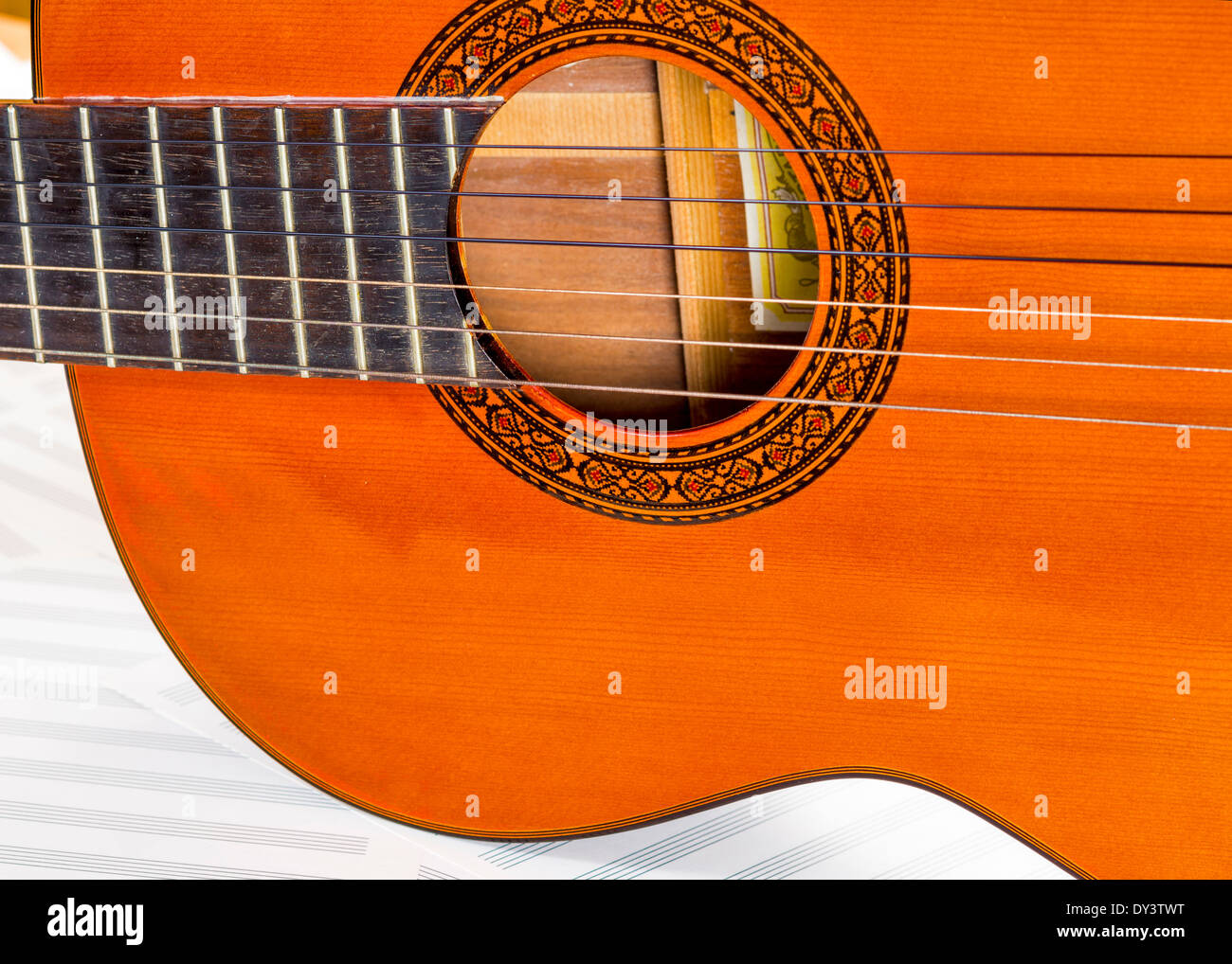 Guitar sound hole and strings Stock Photo Alamy