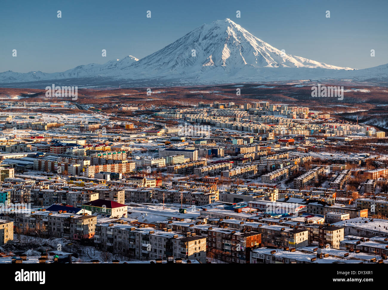 Petropavlovsk-Kamchatsky cityscape and Koryaksky volcano Stock Photo