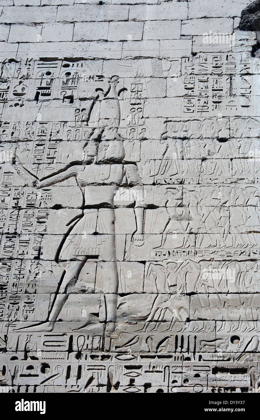 Temple of Ramses III at Medinet Habu: reliefs on the first pylon Stock ...