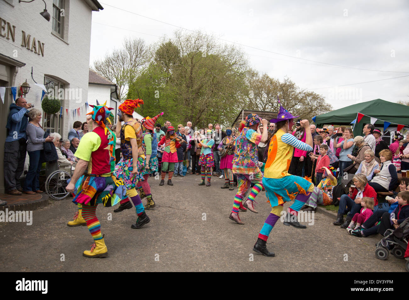 Morris men dancing outside The Green Man Pub during the Daffodil Weekend Thriplow Cambridgeshire England Stock Photo