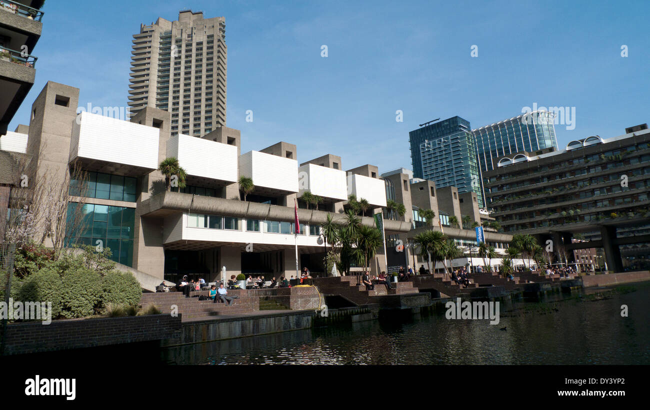 View of people outside at the Barbican Centre exterior plaza restaurant London England UK KATHY DEWITT Stock Photo