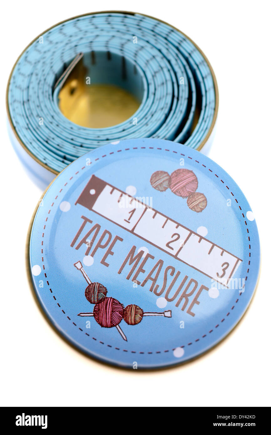Tape Measure coiled in a small blue tin Stock Photo
