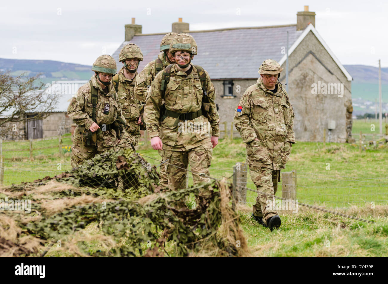 Soldiers enter a forward observation post in a rural location of Northern Ireland Stock Photo