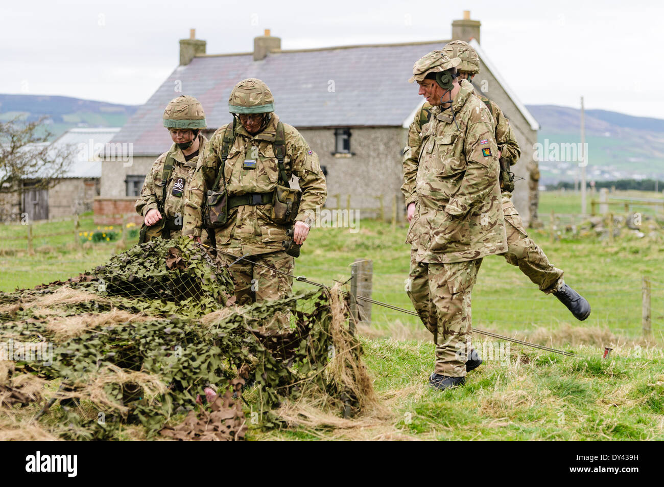 Soldiers enter a forward observation post in a rural location of Northern Ireland Stock Photo