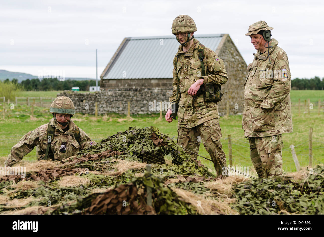 Soldiers enter a forward observation post in a rural location of Northern Ireland Stock Photo