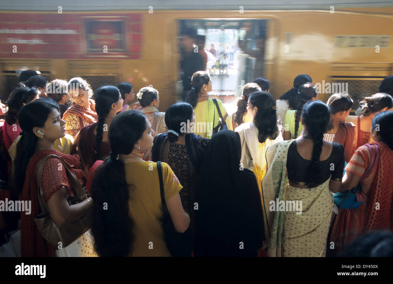 India Mumbai, 6 billion commuter travel in local trains of western railway between city center and suburbans daily, women wait for special woman coach Stock Photo