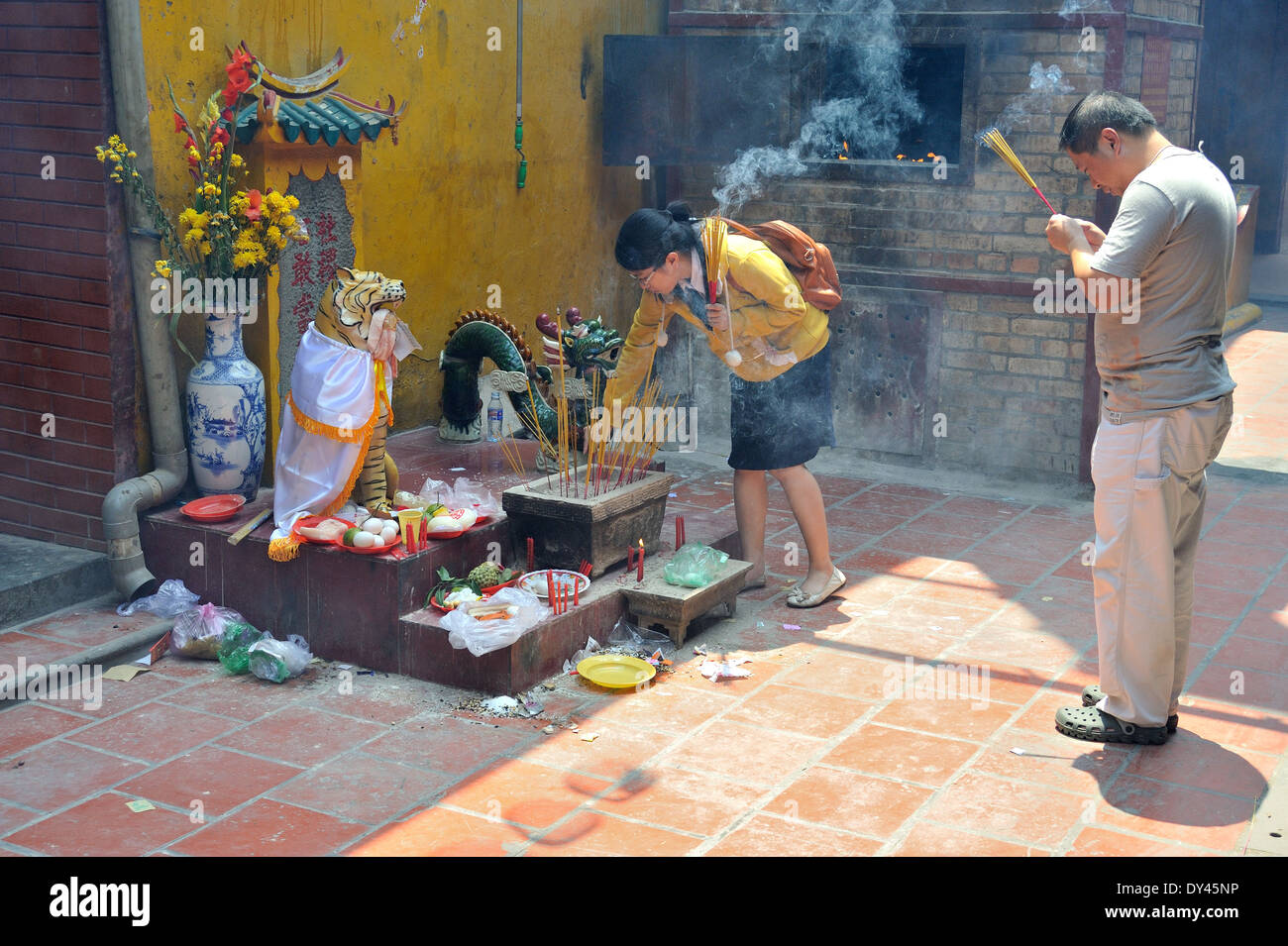 Praying in Thien Hau Temple Ho Chi Minh City Stock Photo
