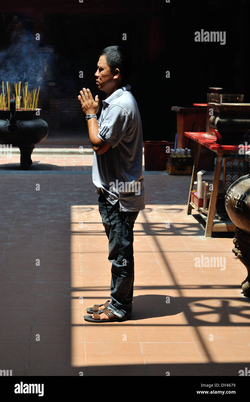 Praying in Thien Hau Temple Ho Chi Minh City Stock Photo