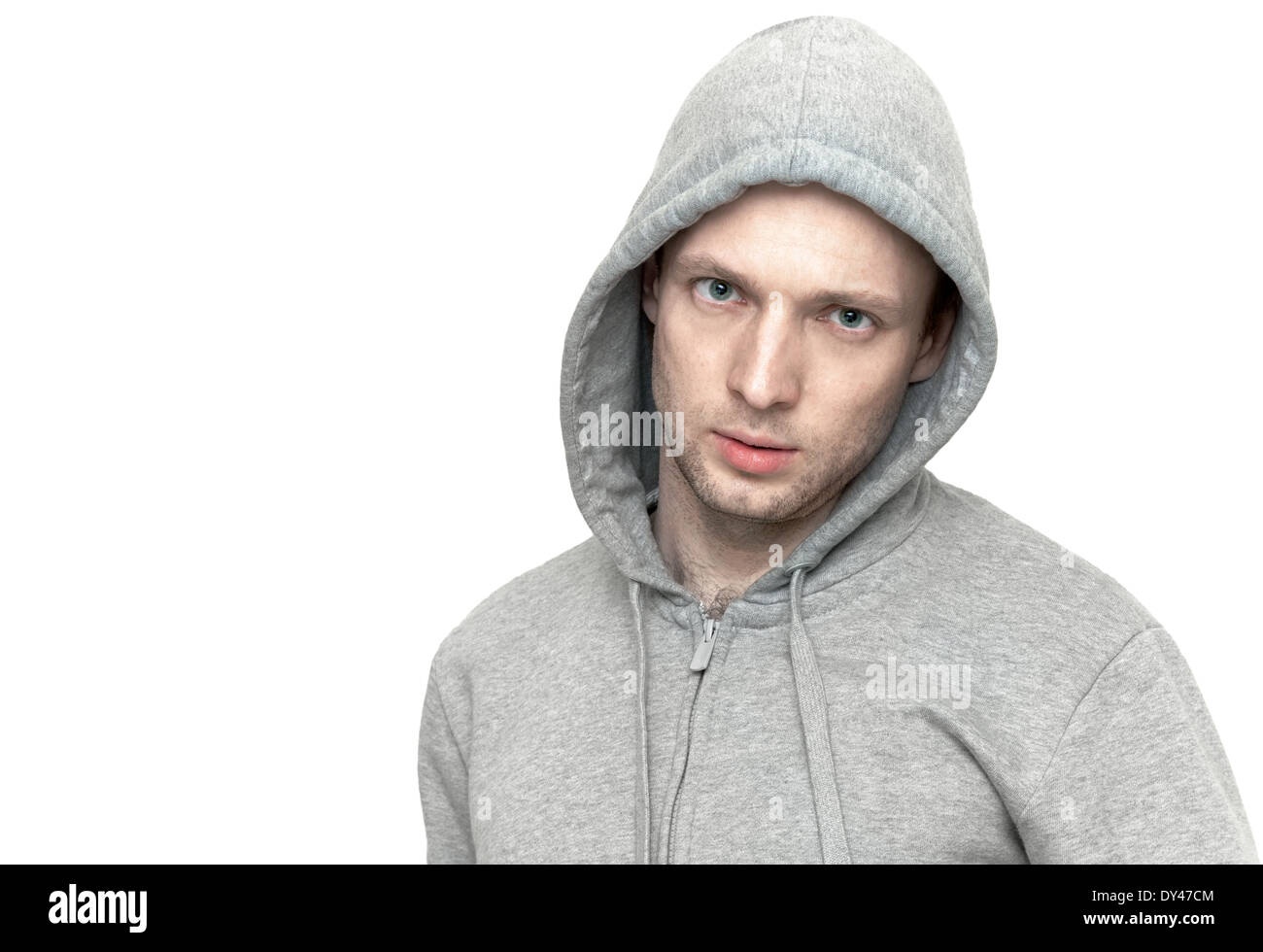 Young Caucasian man in gray jacket with hood. Portrait isolated on white Stock Photo