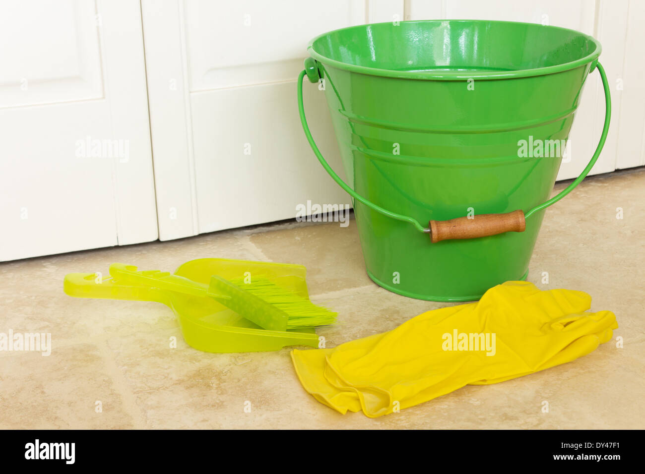 Green Bucket and Yellow Gloves Stock Photo Alamy