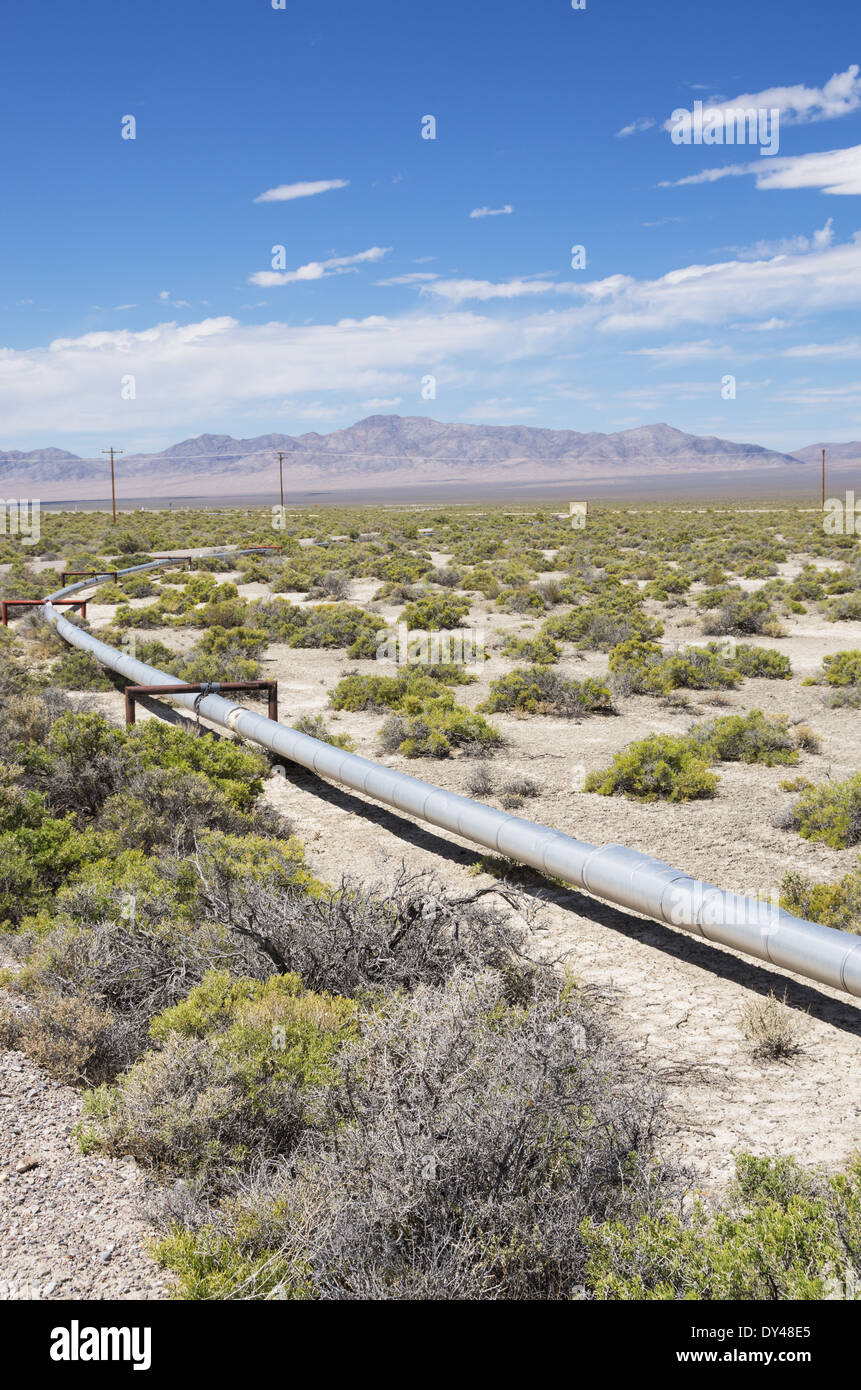 small oil pipeline in a well field in Nevada Stock Photo